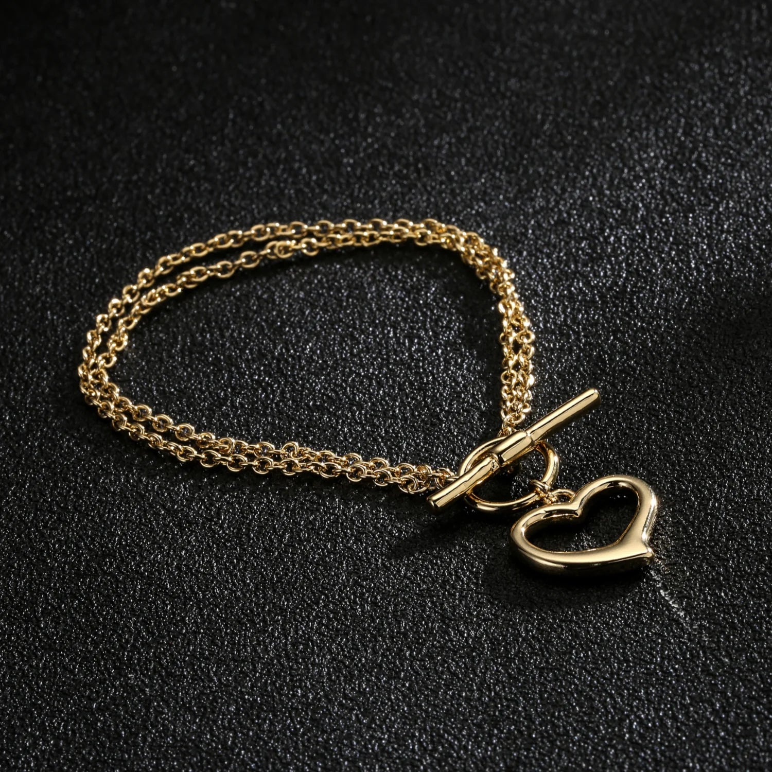 GOLD DOUBLE BRACELET WITH HEART CHARM T-BAR