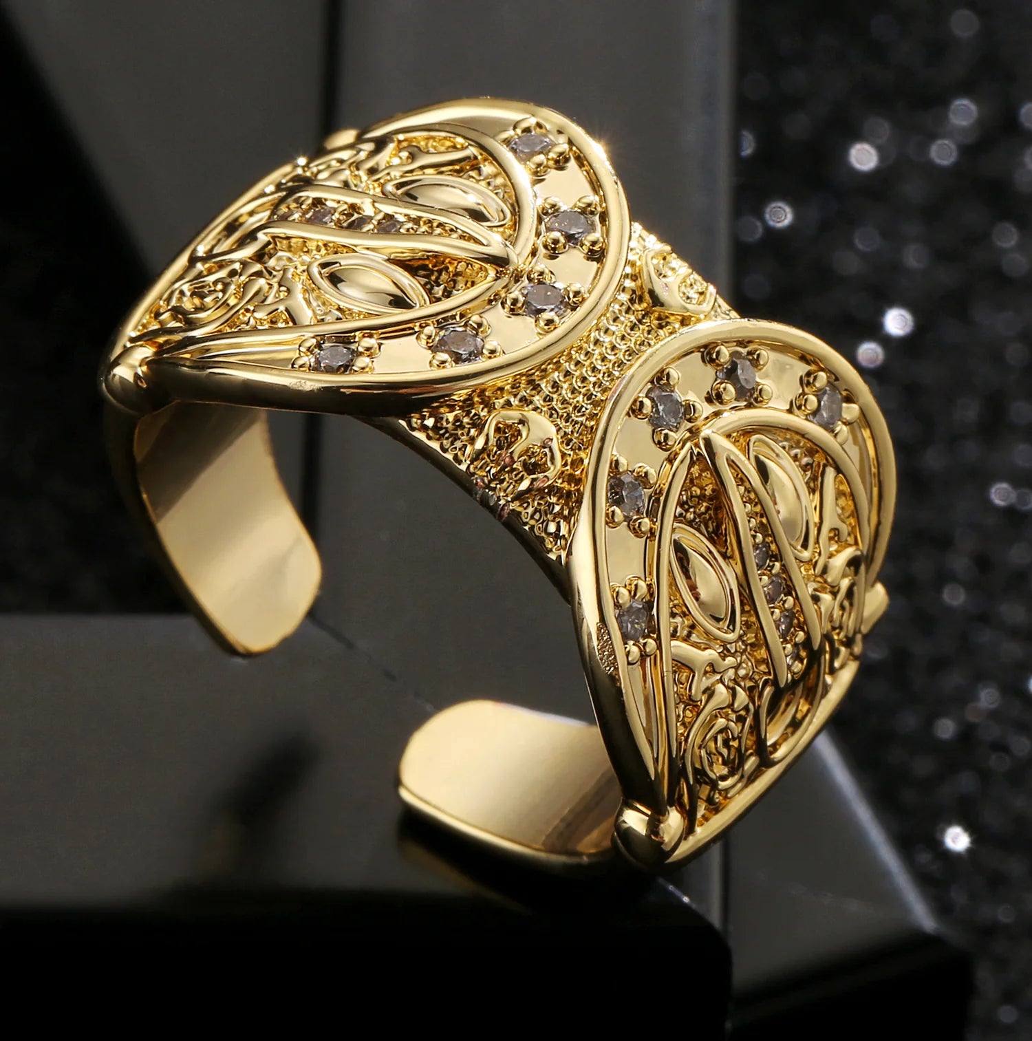 GOLD DOUBLE BUCKLE RING WITH STONES