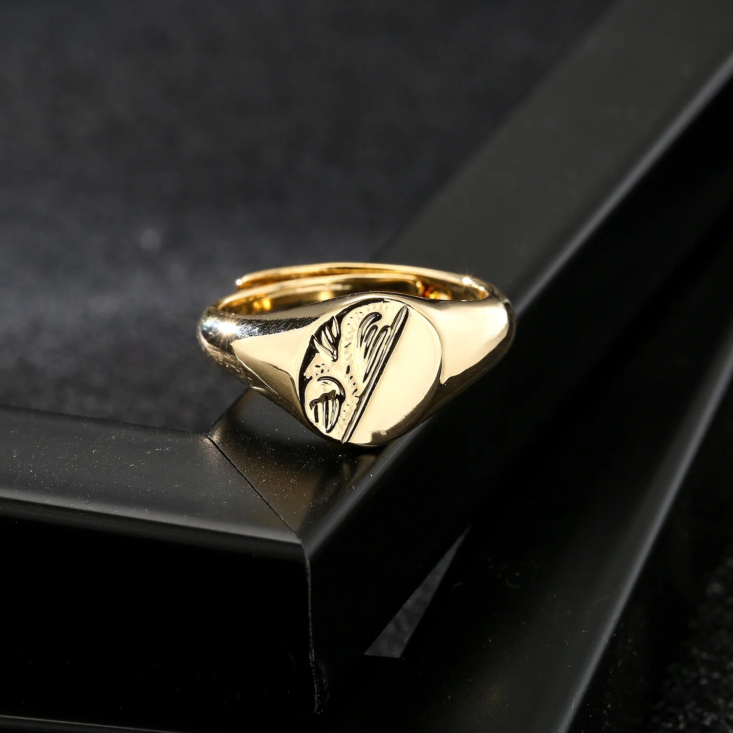 GOLD HALF FACE OVAL RING